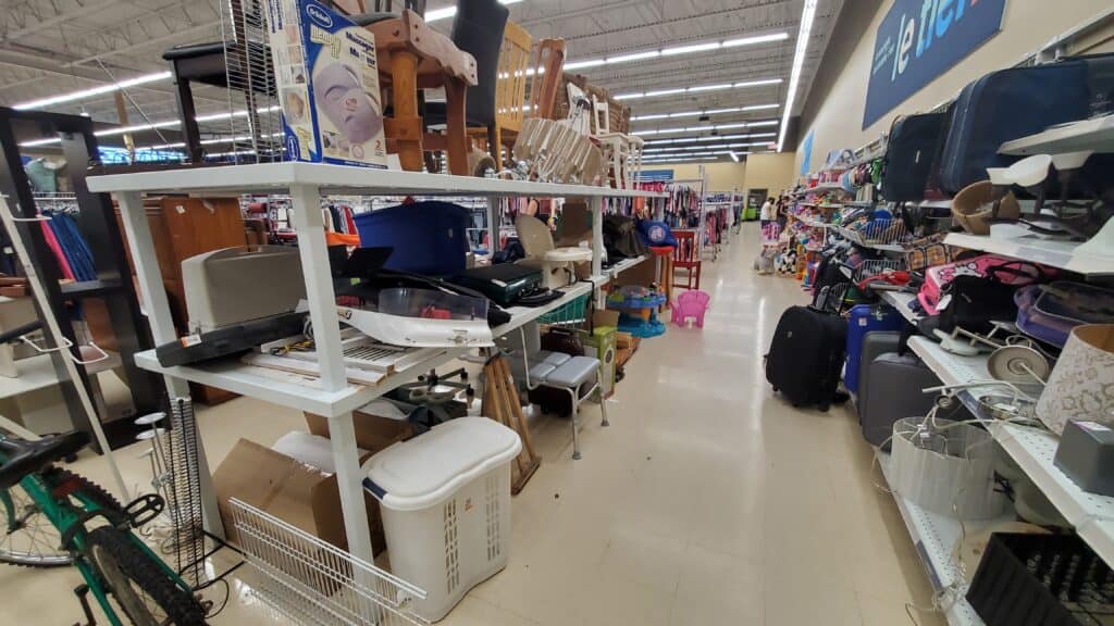 Reuse store displaying secondhand furniture, luggage and laundry basket