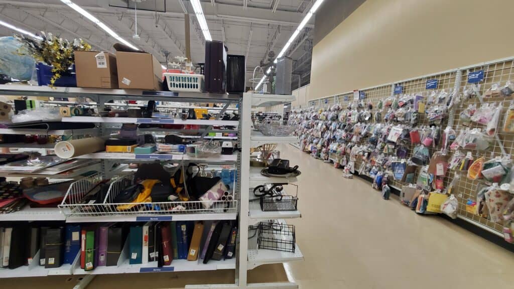 Shelves showing displayed secondhand items in a reuse store